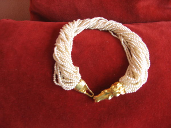 Propose superbe collier torsad� - fermeture t�tes de cheval 15 Hy�res (83)