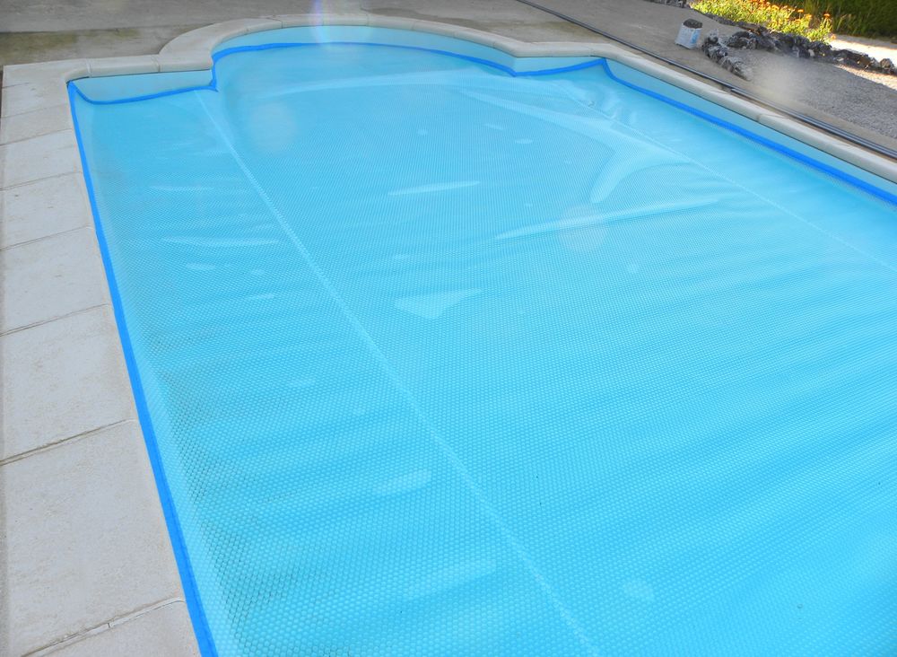 B�che � bulles de piscine + enrouleur 400 Dammartin-Marpain (39)