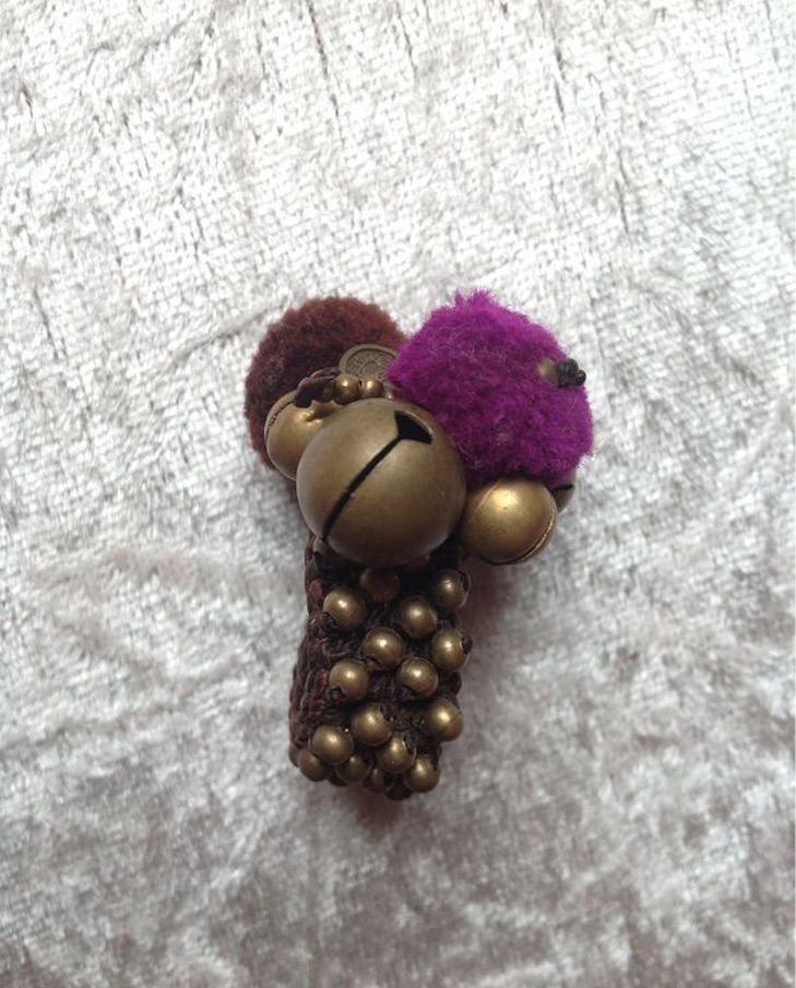 BAGUE GRELOTS POMPONS PI�CE SUR ANNEAU TISS� Envoi Possible
5 Tr�gunc (29)