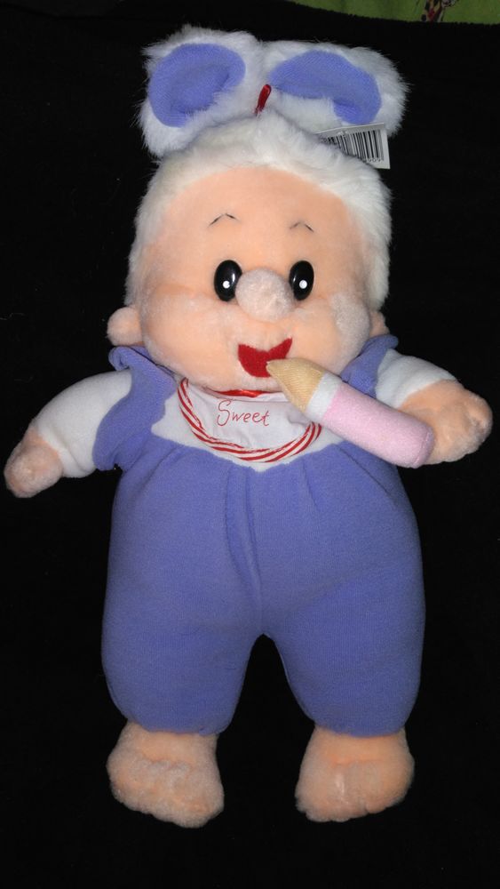 B�b� en mousse tenant son biberon 6 Paris 3 (75)