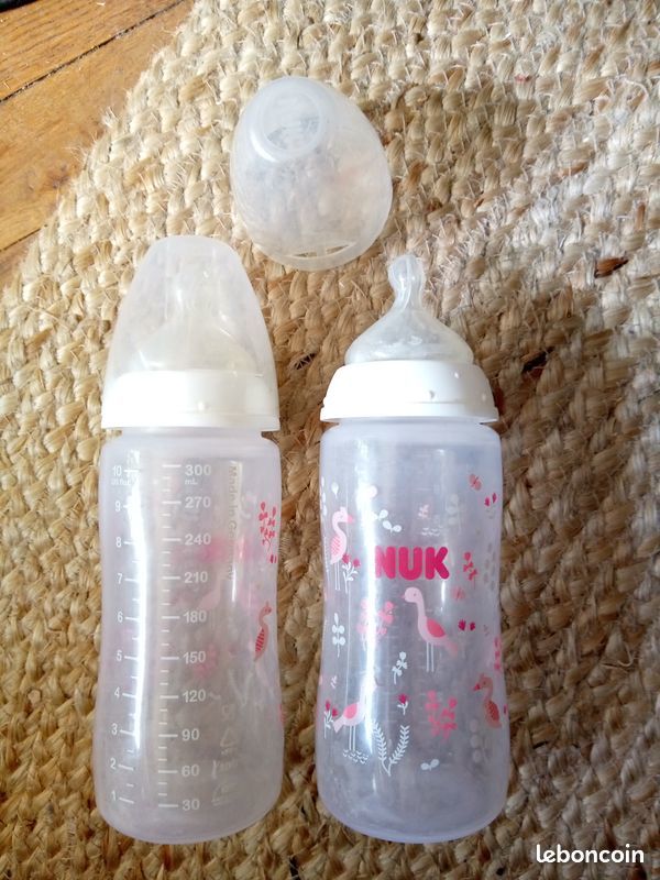 2 biberons Nuk 300 ml avec t�tine anti colique 5 Beauchamp (95)