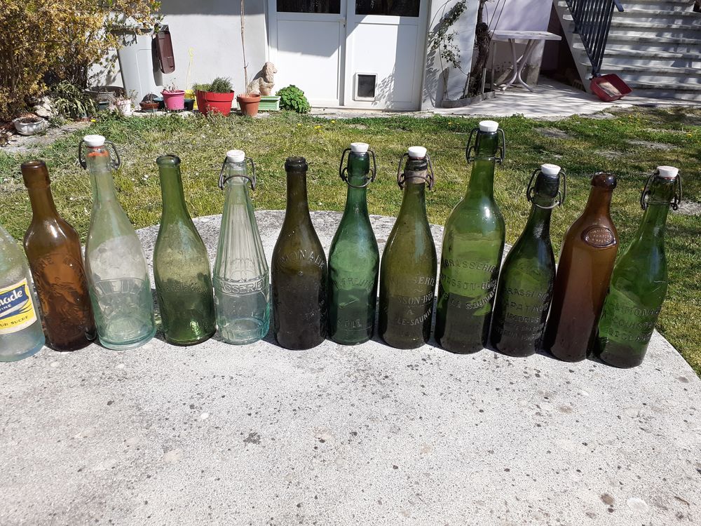 12 Bouteilles diverses LIMONADE ou BRASSERIE . 40 Le Vernois (39)