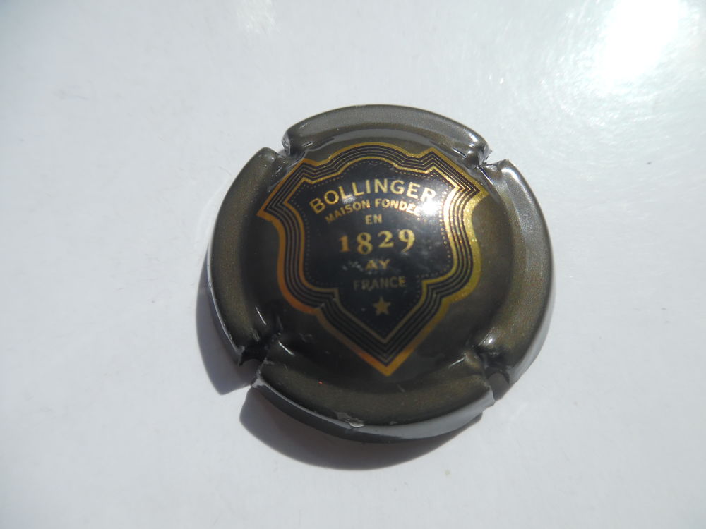 Champagne BOLLINGER  �cusson contour or . 4 Plivot (51)