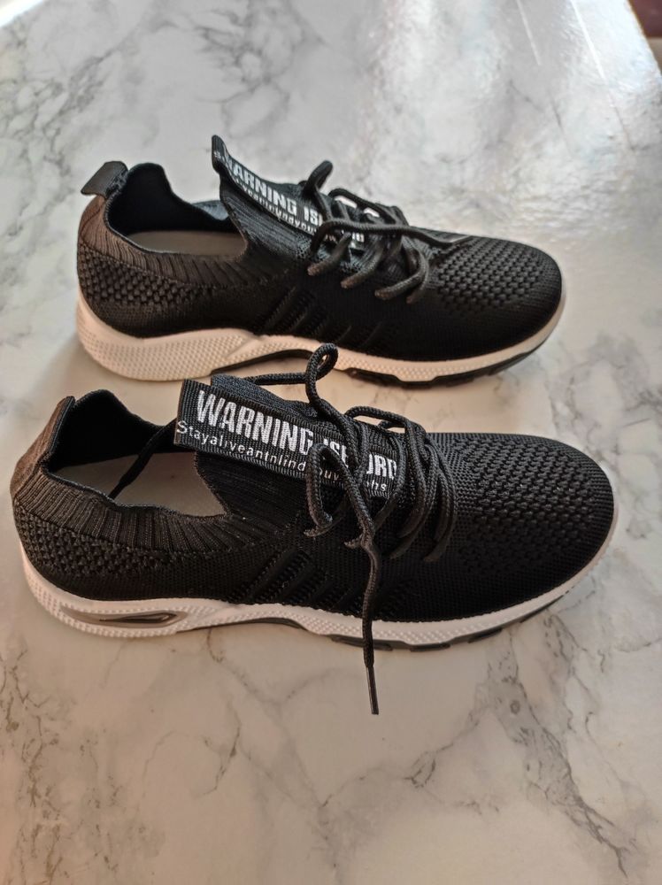 chaussures noires 29 Beaune Les Mines (87)