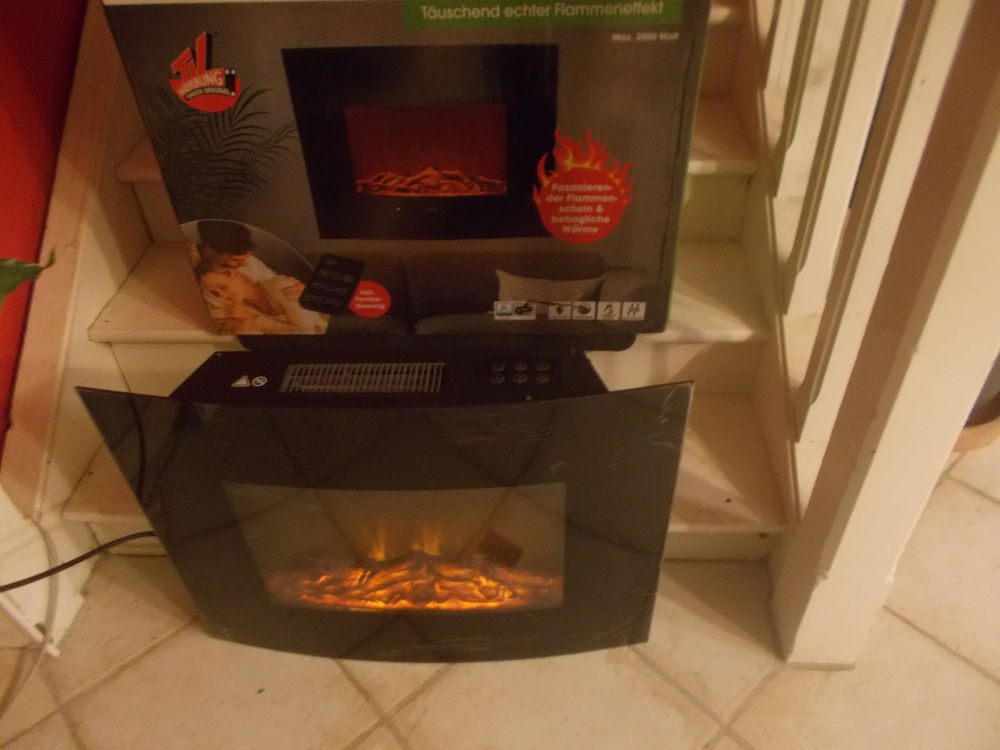 Chemin�e �lectrique nf t�l�commande faire  prix 70 Saran (45)