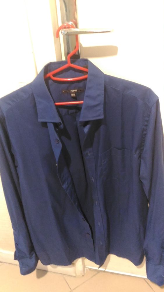 Chemise bleu marine de chez OWK 8 Savigny-sur-Orge (91)