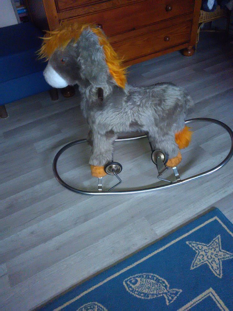 cheval a bascule a roulette