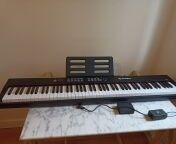 d'un clavier num�rique avec tabouret et p�dale num�riq 120 Saint-Cloud (92)