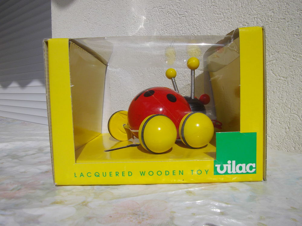 
coccinelle neuve � tirer en bois VILAC 25 Toucy (89)