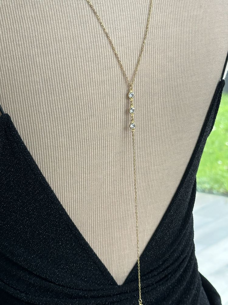 collier dos or acier et strass 19 Villiers-sur-Marne (94)
