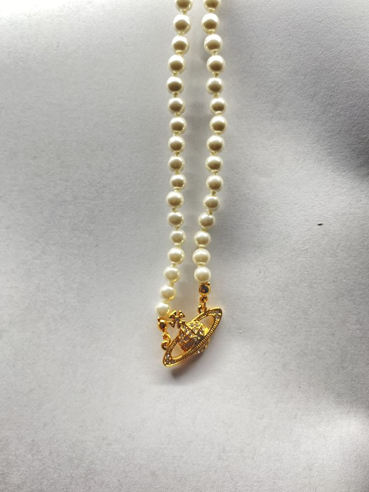 Collier dor�e � perle Vivienne Westwood 74 Soisy-sous-Montmorency (95)