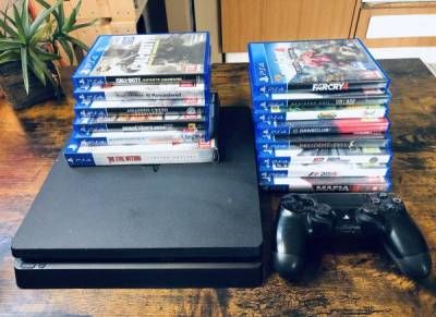 Console PS4 slim 1to 2 manettes 14 jeux 180 Arles (13)