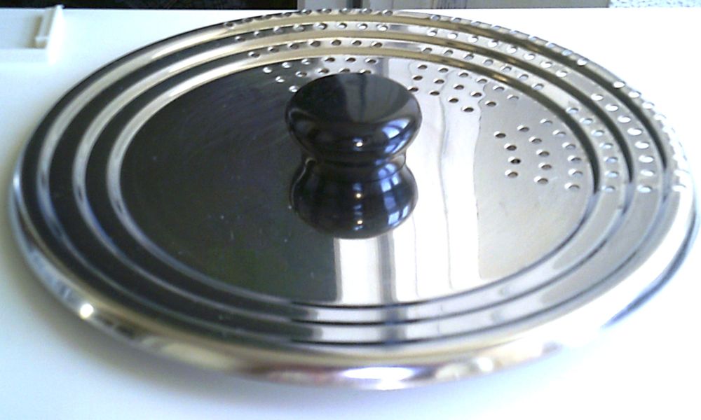 Couvercle passoire inox multi-tailles 16 � 22,5 cm, tbe
4 Villeurbanne (69)