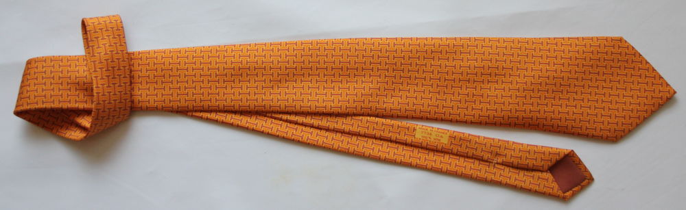 Cravate soie orange H  HERMES 130 Issy-les-Moulineaux (92)