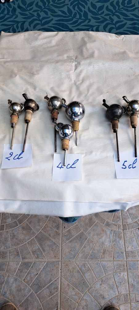 7 doseurs  boule  anciens de bar 70 La Fert� (39)