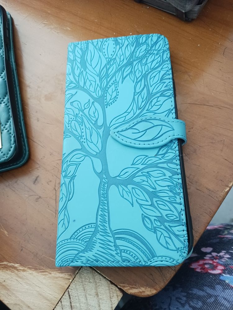 �TUI EN CUIR VERT MOTIFS 14 Caen (14)