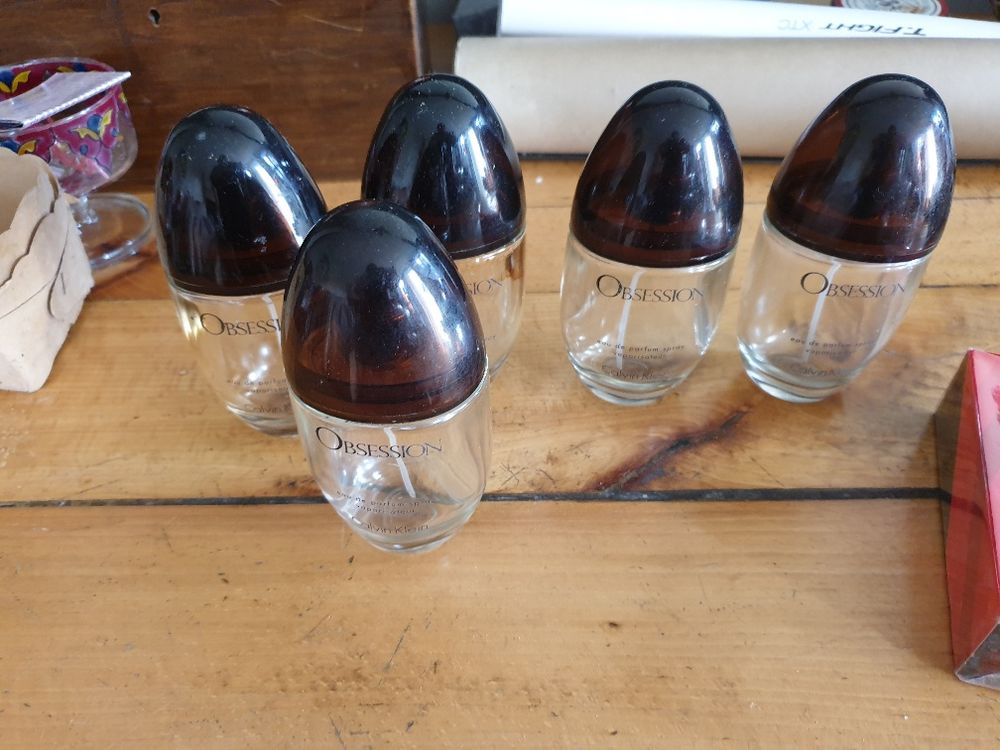 5 Flacons d'eau de parfum femme vide Obsession Calvin Klein 5 Mouxy (73)