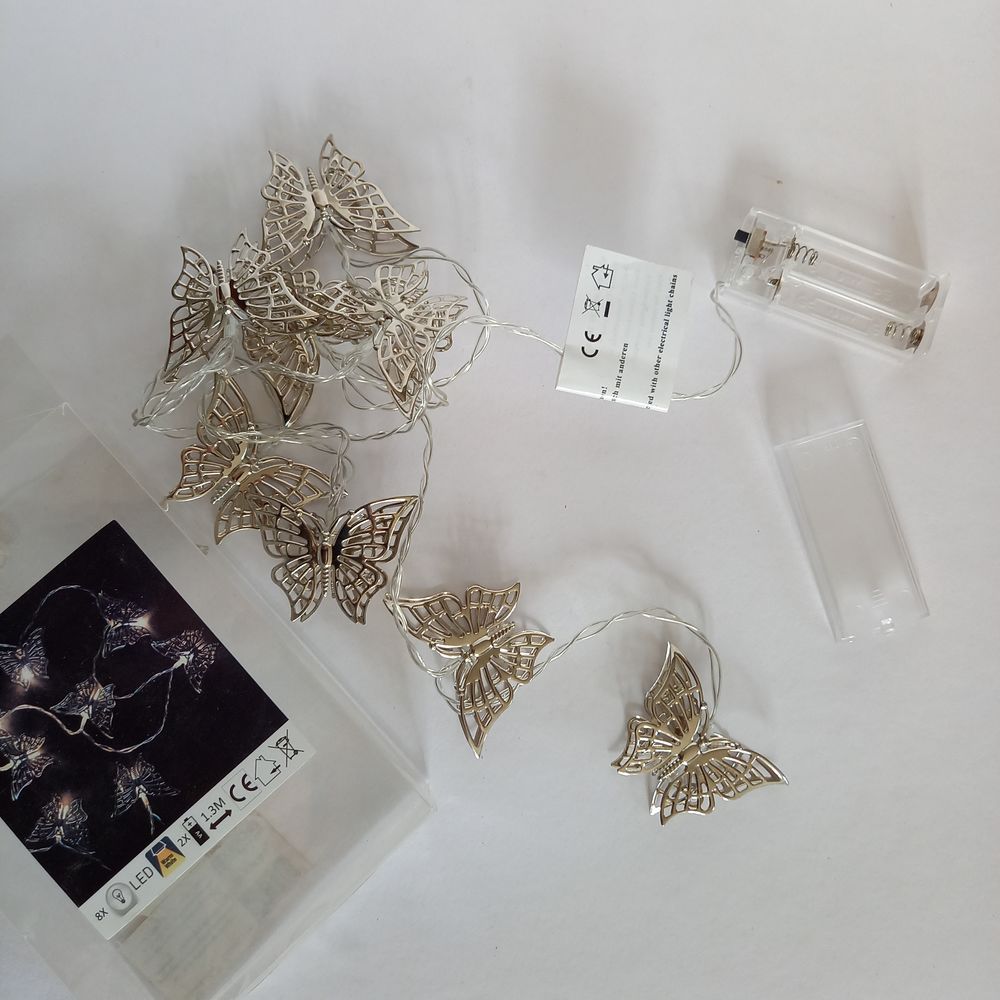 Une guirlande lumineuse led papillons couleur argent 13 Saumur (49)