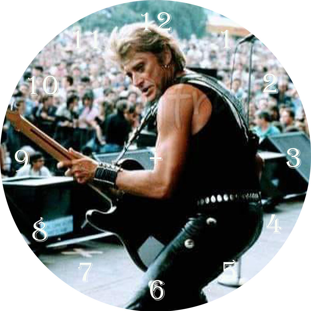 HORLOGE JOHNNY HALLYDAY DIAMETRE 20 CM 
VERRE ET PLASTIQUE 2 29 Loures-Barousse (65)