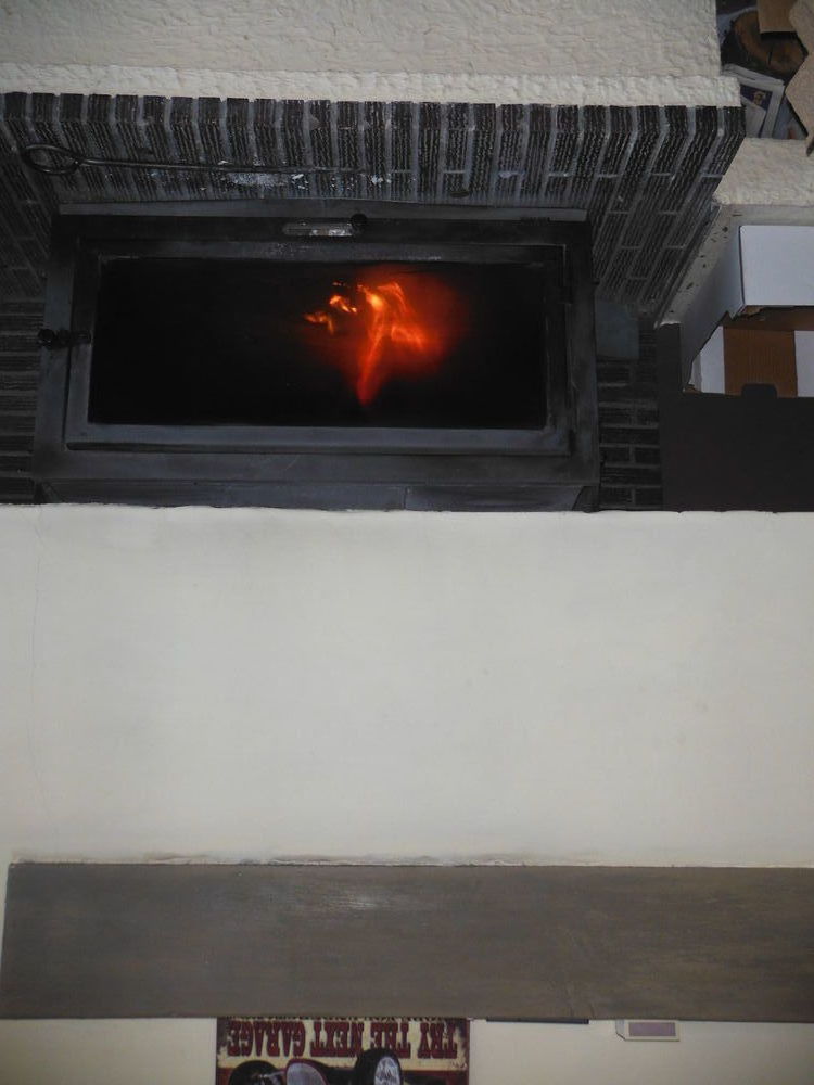 INSERT DE CHEMINEE OUVERTE AVEC CONDUIT 
200 Vizille (38)