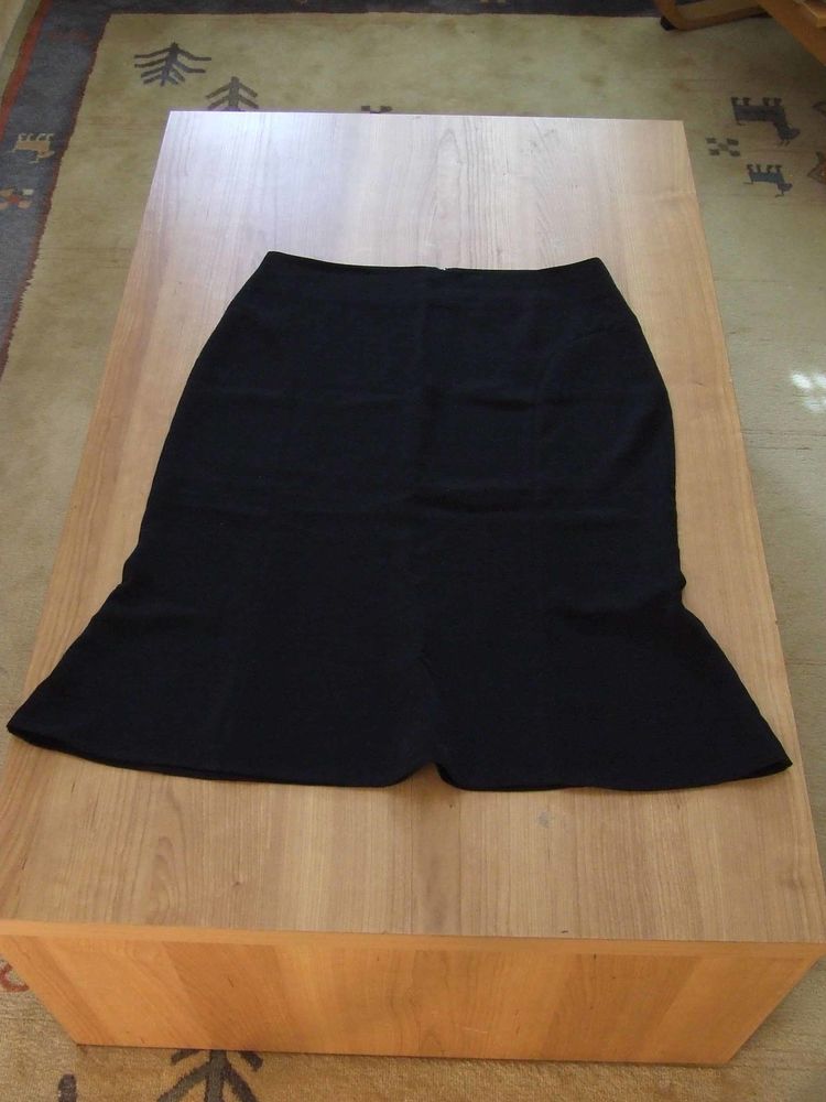 Jupe midi. CAMA�EU. Noir. T. 42. TBE 11 Bagnolet (93)