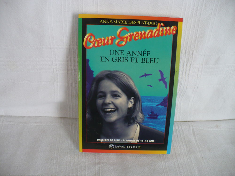 *L128 	
Coeur Grenadine une ann�e en gris et bleu		 2 Marseille 6 (13)