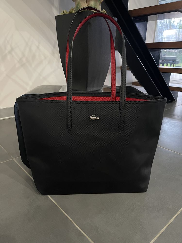 sac Lacoste r�versible rouge et noir Neuf 60 Pont-de-l'Is�re (26)