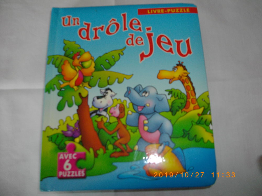 LIVRE AVEC HISTOIRE ET PUZZLES :  UN DROLE DE JEU  5 Perros-Guirec (22)