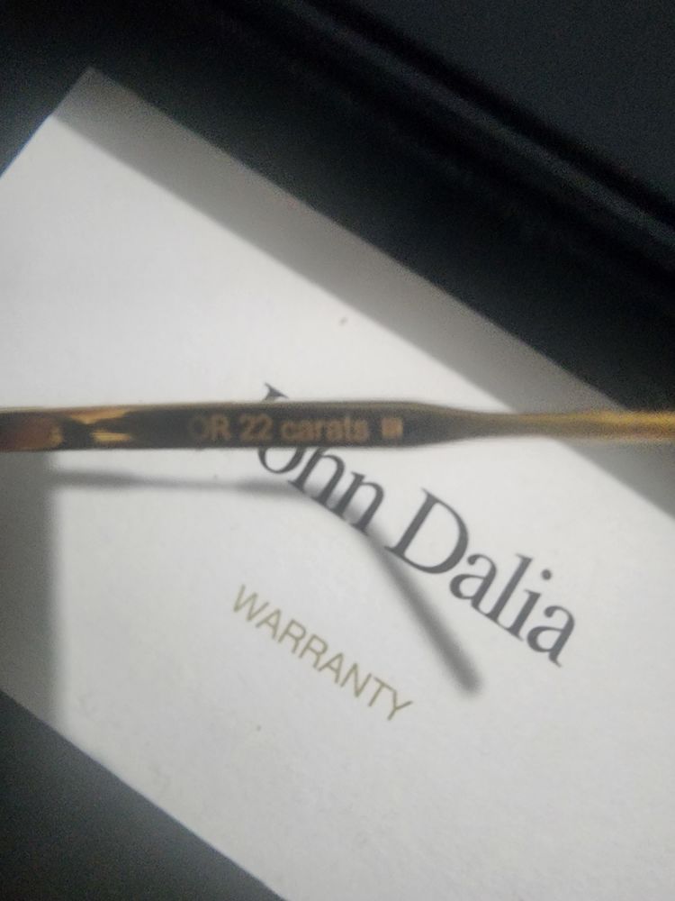 Lunettes de soleil John dalia en or 22 carats 600 Thiais (94)