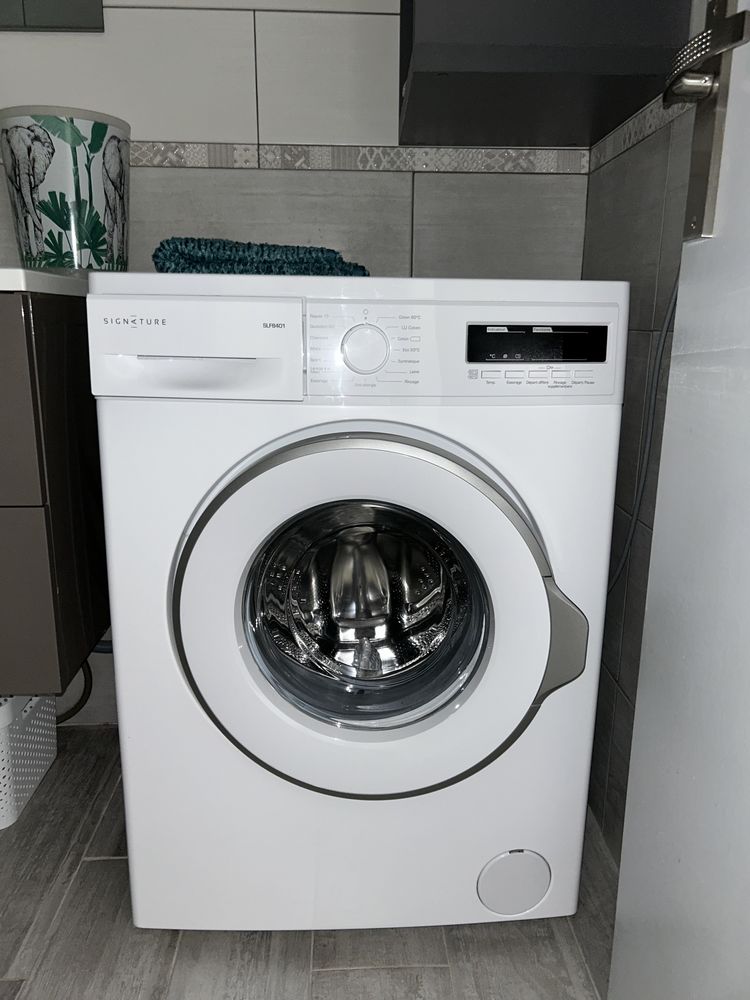 Machine � laver signature 230 Nancy (54)