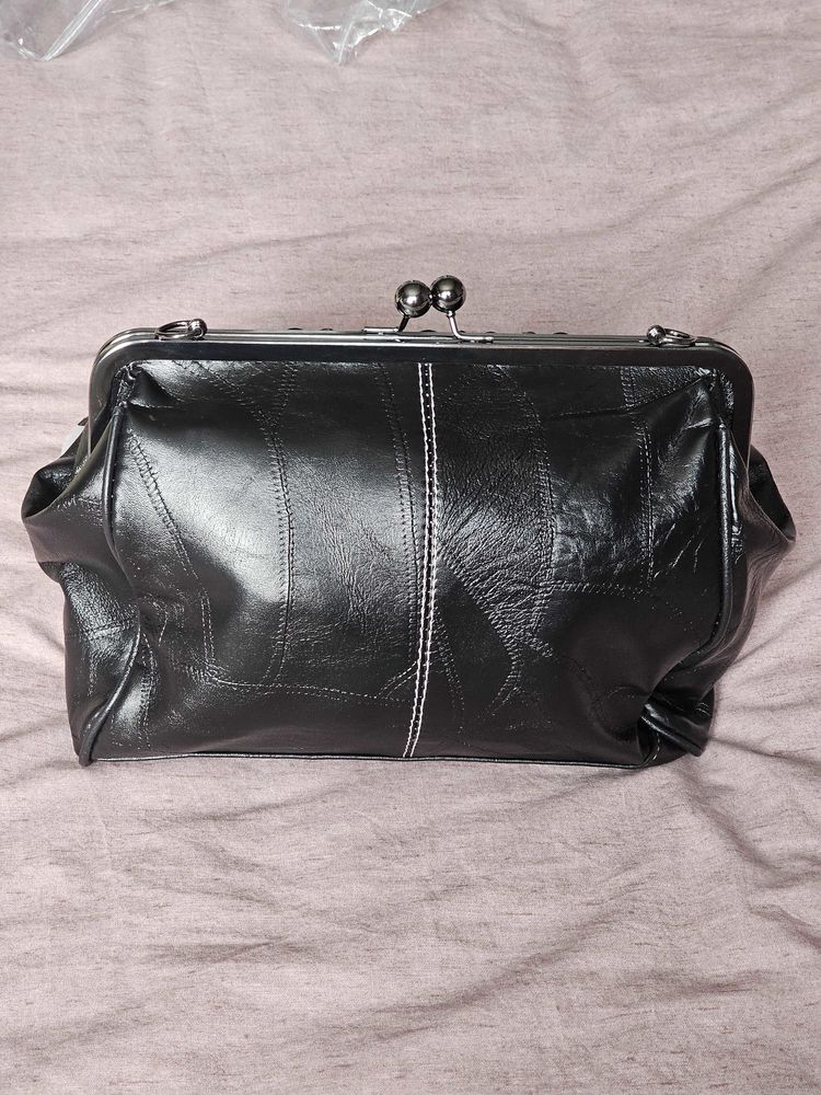 sac �  main noir Neuve 25 Morhange (57)