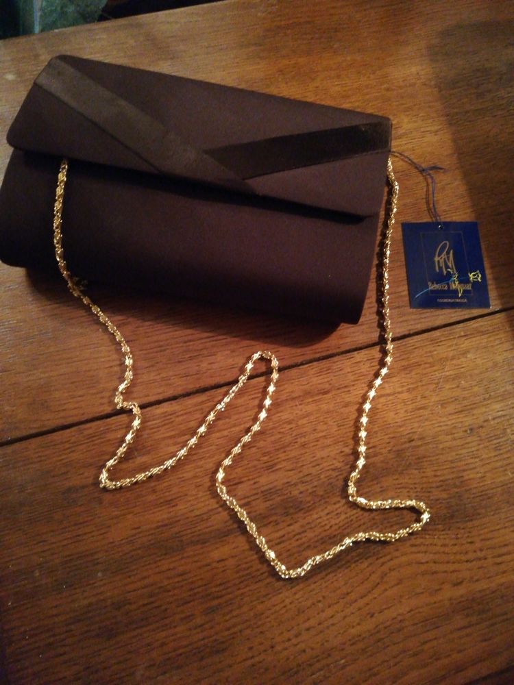 Sac �  main/REBECCA MOLENAAR/ITALIEN/port� �paule/MAIN 15 �cuisses (71)