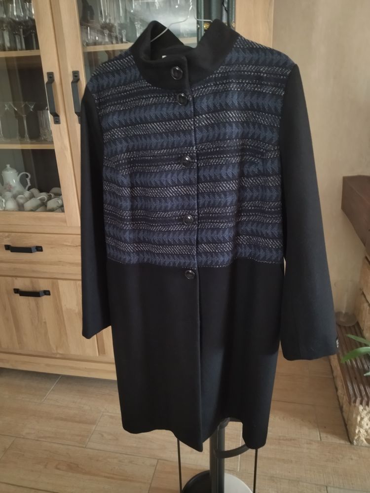 Manteau femme.
30 Villeneuve-sur-Allier (03)