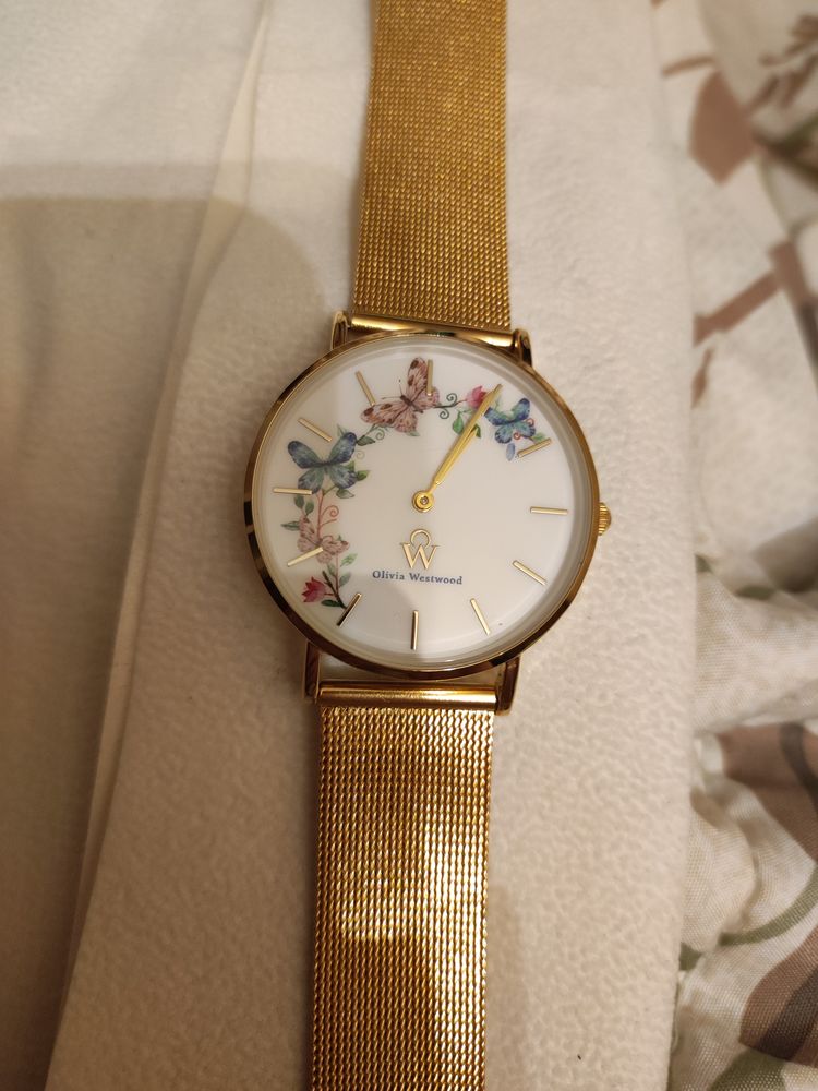 Montre acier inoxydable dor� Olivia Westwood. Neuve. 220 Verneuil-sur-Seine (78)