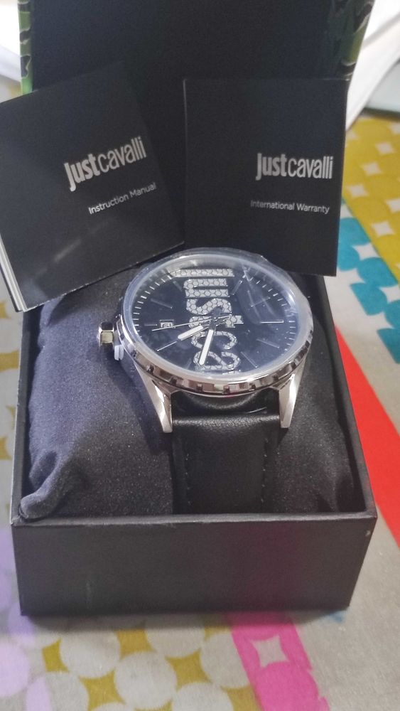 Montre mixte acier inoxydable et bracelet cuir. Just Cavalli 250 Verneuil-sur-Seine (78)