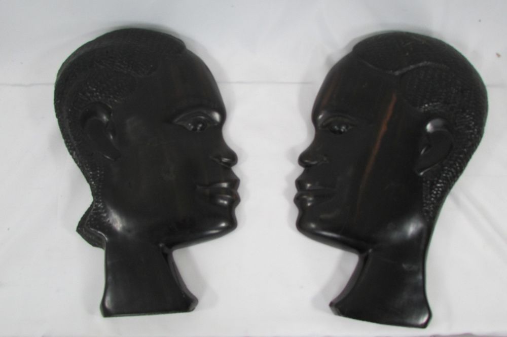 Paire d'appliques murales: T�tes africaines en �b�ne,1990s 60 Paris 8 (75)