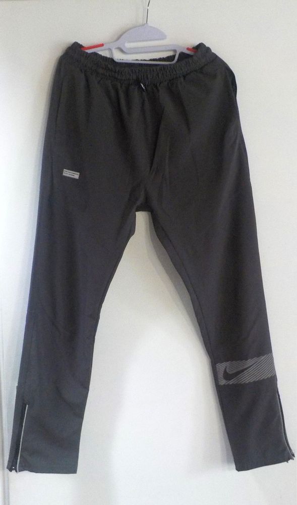 PANTALON JOGGING GRIS FONCE NIKE DRI-FIT TAILLE L 30 Bubry (56)