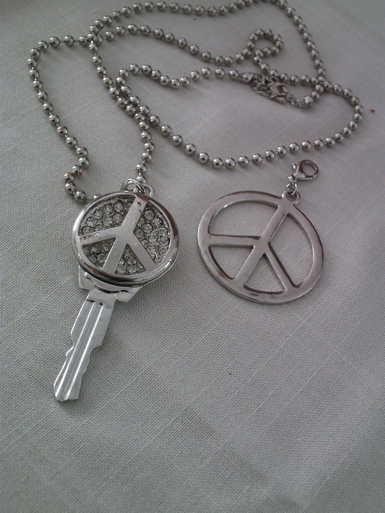 Parure sautoir porte cl�s signe paix N�1100
5 Beaune (21)