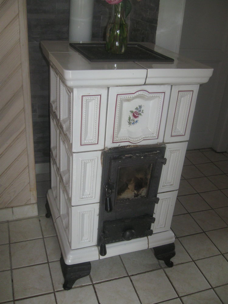 poele a bois en fience oliger caloristar
a venir chercher 400 Granges-sur-Vologne (88)