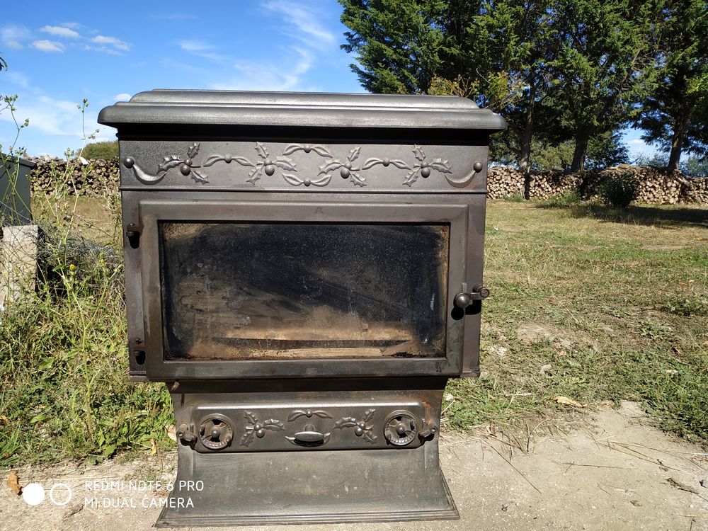 Po�le � bois marque invicta mod�le le  cossu 200 Pleumartin (86)