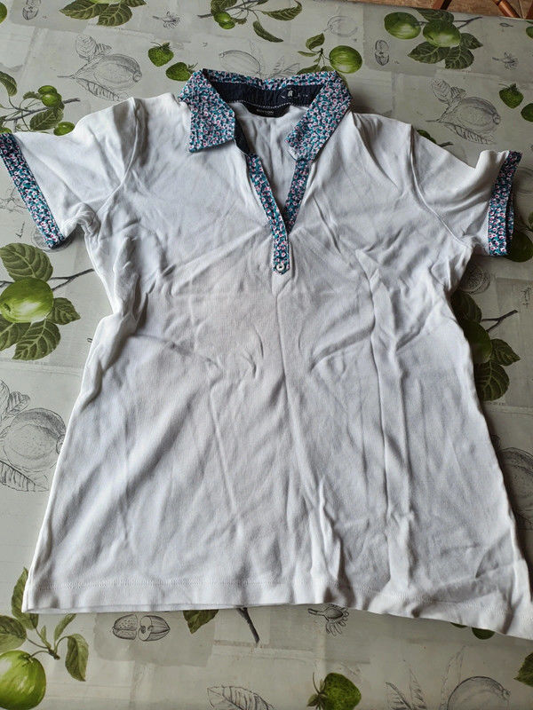 Polo blanc et fleur
taille 38
burton of london 3 Aubvillers (80)