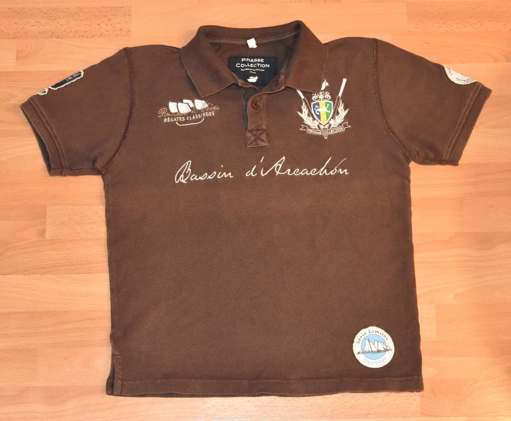 Polo chocolat.  PINASSE Collection. 12 ans. Tr�s bon �tat 14 Gujan-Mestras (33)