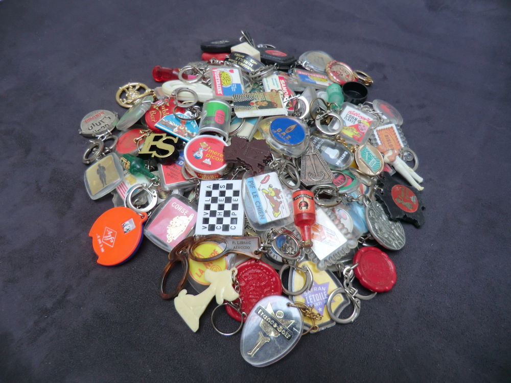 Lot de 100 porte cl�s publicitaires 30 Cagnes-sur-Mer (06)