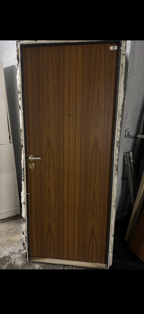 Porte int�rieure vein�e avec poign�e en m�tal 300 Clichy-sous-Bois (93)