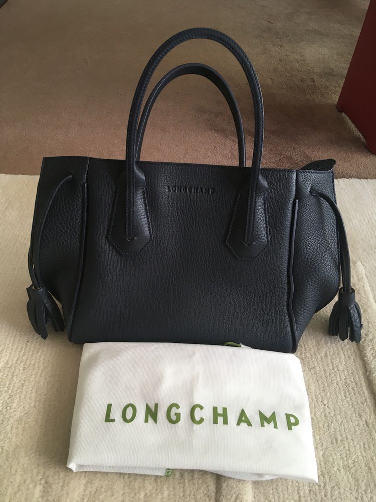 Sac port� main LONCHAMP 180 Paris 17 (75)