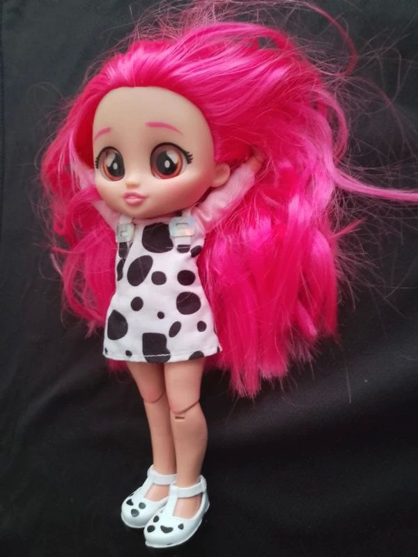 Poup�e B.F.F. Articul�e aux cheveux rose. 26 Limoges (87)