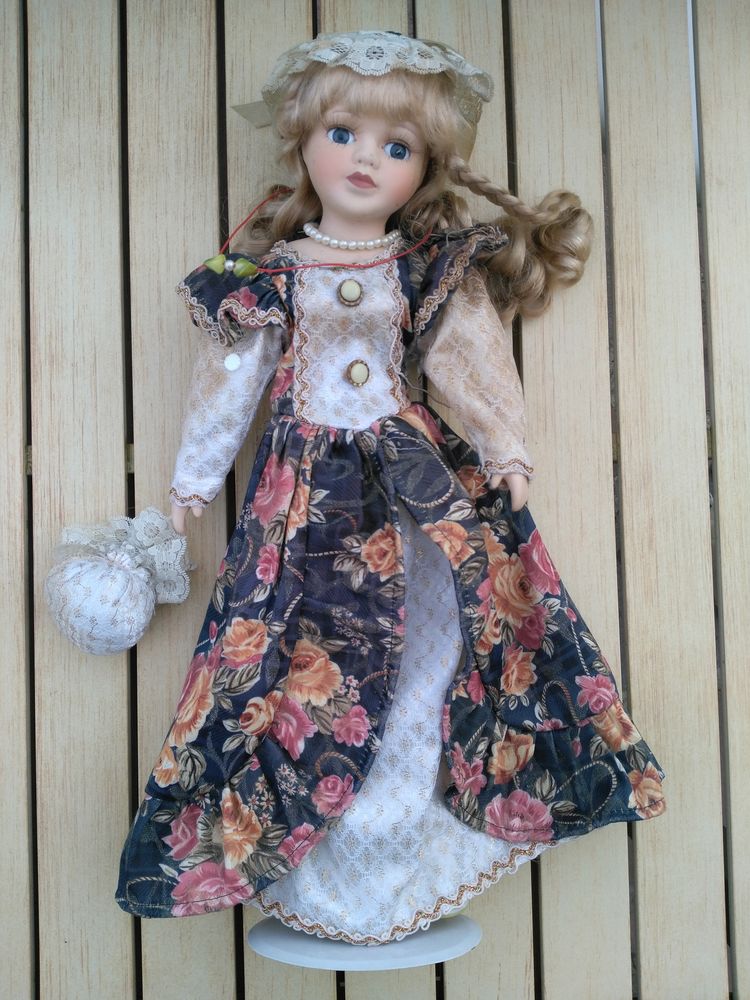 Poup�e en porcelaine avec baluchon
5 Breuillet (91)