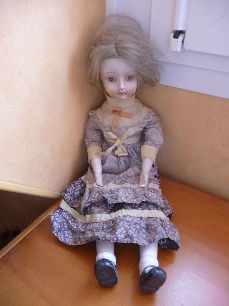 Poup�e en porcelaine (t�te, mains, pieds) vintage
59 Mouvaux (59)