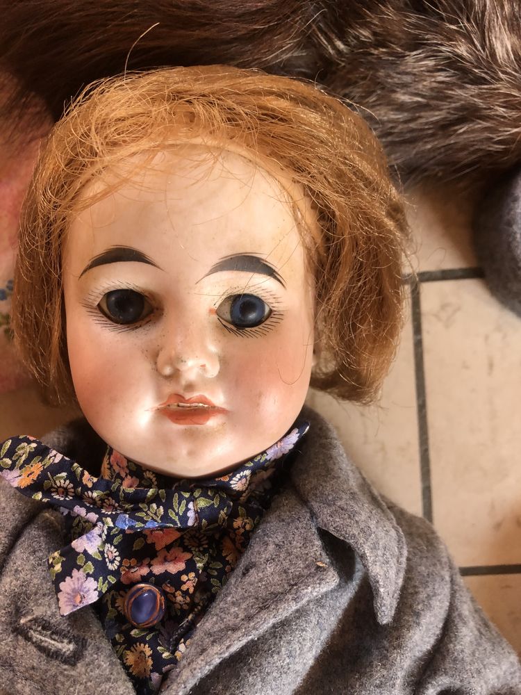 POUP�E TETE PORCELAINE 0 Mouillac (33)