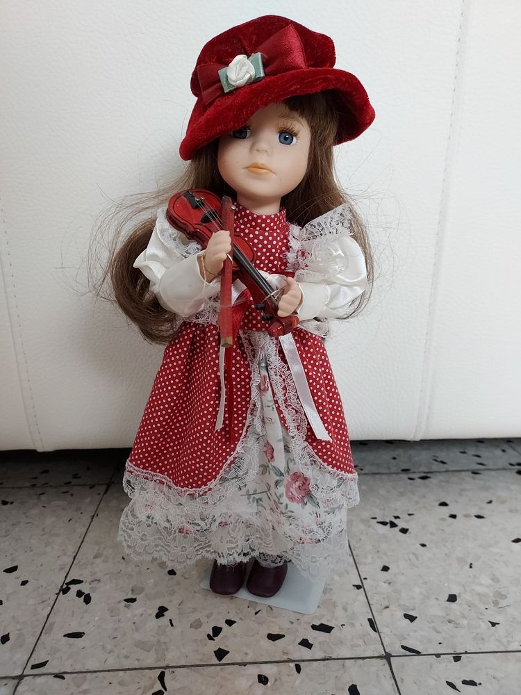 Poup�e violoniste sur son socle
5 Calais (62)